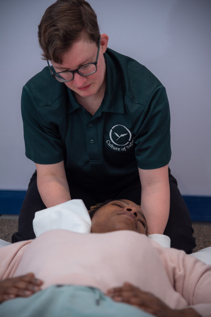 person receiving neck shiatsu massage
