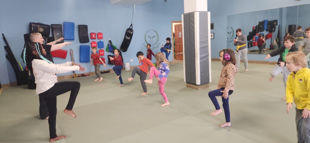Children doing karate techniques